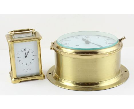 A 20th century carriage clock and brass cased ships clock