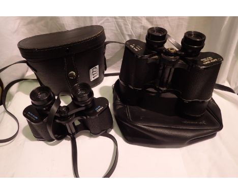 Two pairs of binoculars, Prinz and Zenith. P&amp;P Group 2 (£18+VAT for the first lot and £3+VAT for subsequent lots) 