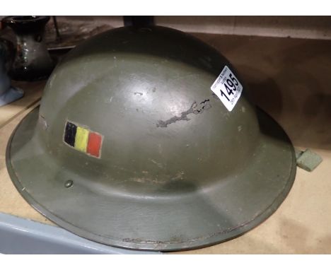 Post war helmet dated 1952, with painted Belgian flag on one side. P&amp;P Group 2 (£18+VAT for the first lot and £3+VAT for 
