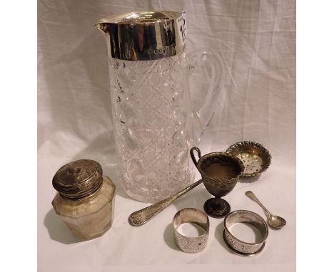 Mixed silver items including a silver topped water jug, napkin rings etc. P&amp;P Group 2 (£18+VAT for the first lot and £3+V