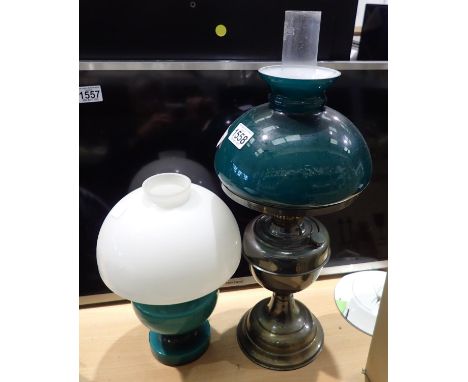 Paraffin table lamp with green glass shade and another, largest H: 54 cm (2). P&amp;P Group 3 (£25+VAT for the first lot and 