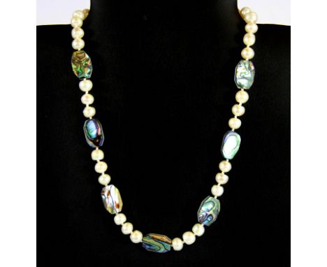 A single strand limited edition cultured pearl and paua shell necklace with certificate.