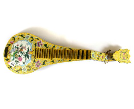 A lovely Chinese hand enamelled porcelain model of a stringed musical instrument, L. 76cm.