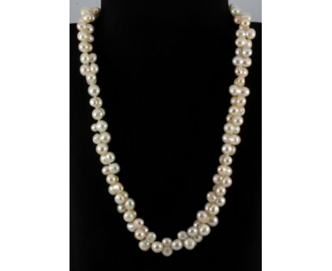 An unusual baroque cultured pearl necklace, L. 54cm.