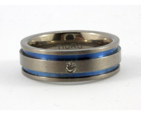 A gentleman's titanium diamond set ring, (P.5).