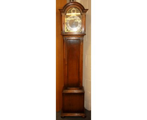 A brass dial oak longcase clock, H. 188cm.