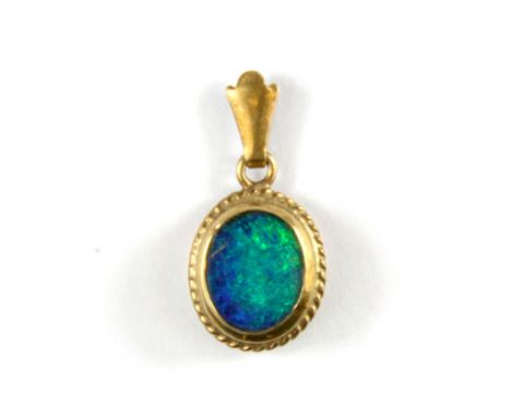 A 9ct yellow gold opal doublet set pendant.