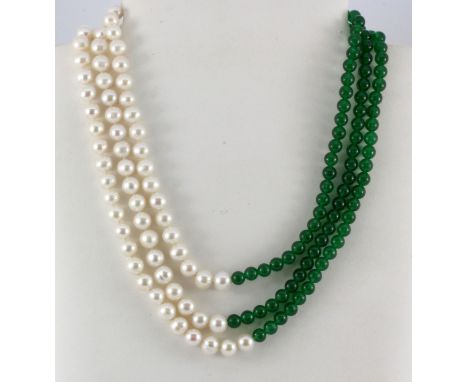 A three row pearl and jade bead necklace, L. 48cm.