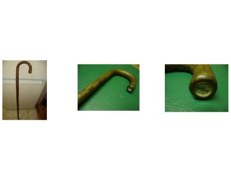 Petrol Lighter/Compass StickAn interesting crook handled walking stick. The handle can be screwed of to reveal a fully functi