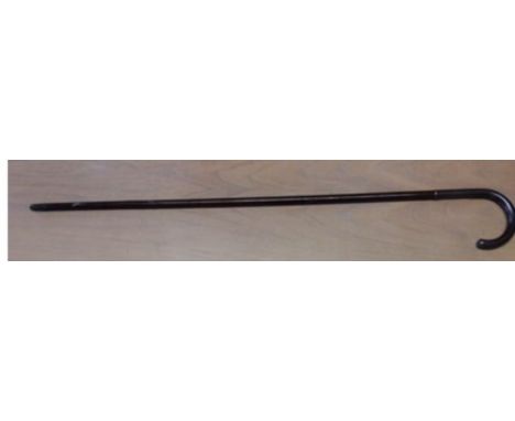 A steel walking stick with a concealed cavity in the lower portion of the handle.This cavity is 2 ¼” /570mm long and 3/8” /60