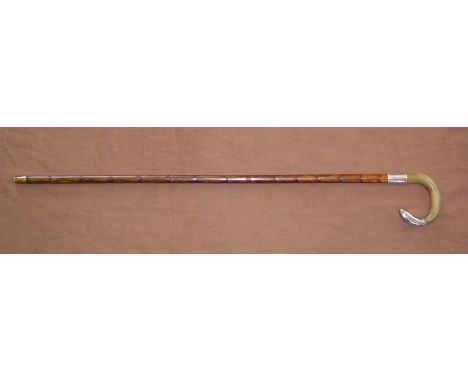 Gentleman’s sword stick. A fine slim gentleman’s walking stick with silver mounts and sword. The stick is of bamboo and the h