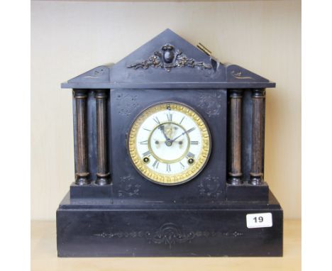 A 19th century French slate mantel clock, W. 35cm, H. 35cm.