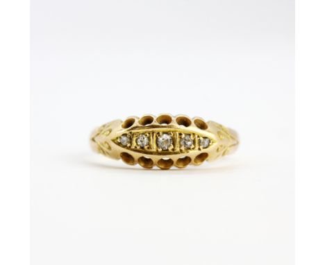 An 18ct yellow gold diamond set ring, (O).