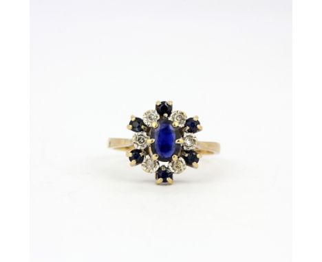 A 9ct yellow gold sapphire and diamond set cluster ring, (P.5).