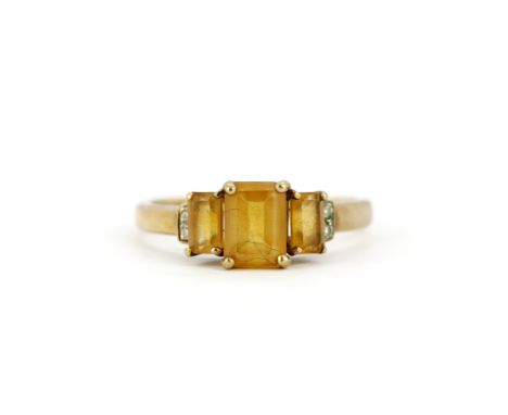 A 9ct yellow gold citrine set ring, (P.5).