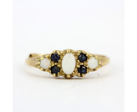 A 9ct yellow gold ring set with cabochon cut opals and sapphires, (Q).