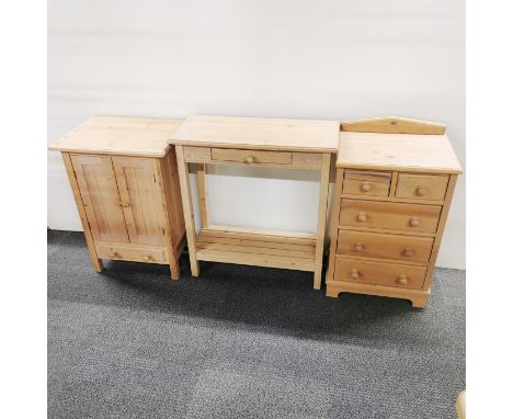 A pine single drawer console table together with a small pine bedside cabinet and a small pine five drawer chest, console tab