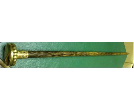 An antique cane for the cigarette smoking traveller, Set into the beaded decoration round the brass handle of this cane is a 