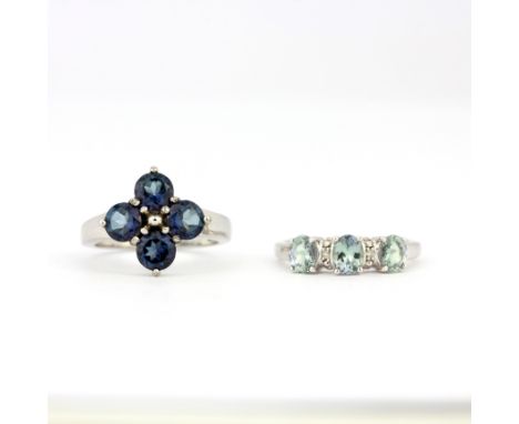 A 925 silver ring set with blue topaz and a 925 silver blue stone set ring, (M).