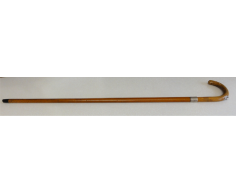 A Brigg Pencil Stick. A Malacca cane with a hidden pencil set into the crook handle. Supposedly used by the bookmakers at rac