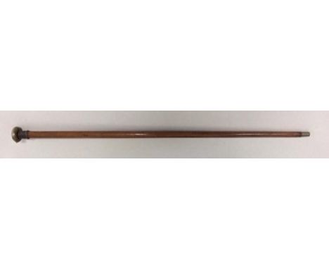 An attractive cane which has a brass handle. The upper section consists of a hinged compartment which holds an old slim pocke