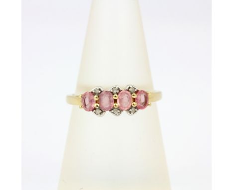 A 9ct yellow gold ring set with oval cut pink sapphires and diamonds, (O).