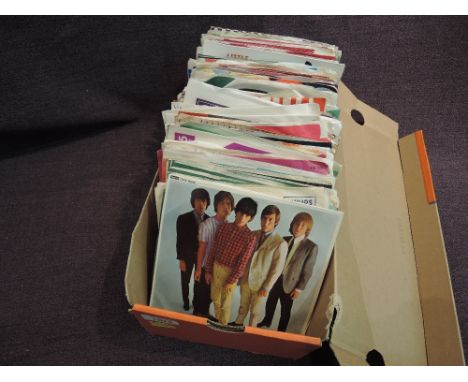 Box of various 50's / 60's 45's with Rolling Stones , Beatles and more - many in original company sleeves 