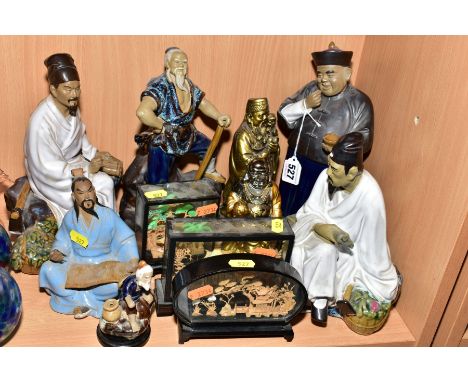 A GROUP OF JAPANESE CERAMIC FIGURES, including two seated scholars, a seated scribe, man with axe, man holding a pot, and fis