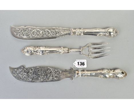 A SILVER FISH SERVING SET AND ONE OTHER SILVER FISH KNIFE, the set with an embossed foliate handle, foliate decoration to the