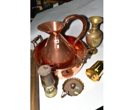 A COPPER HAYSTACK MEASURE, height 38cm, a twin handled copper bowl with pouring lip, handle to handle 45cm, a brass bottle ja