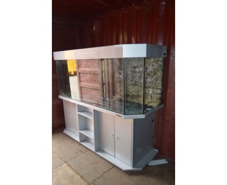 A LARGE AQUA MEDIC AQUARIUM, canted front corners, light grey cornice on a matching base with four cupboard doors, width 205c