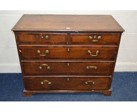 A GEORGIAN OAK AND MAHOGANY BANDED CHEST OF TWO SHORT AND THREE LONG GRADUATED DRAWERS on bracket feet, width 105cm x depth 4