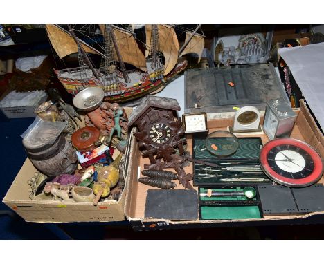 TWO BOXES OF CLOCKS, DRAWING INSTRUMENTS, SOAPSTONE CARVINGS ETC, including a Gilette display case, a model wooden galleon wi