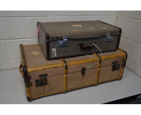 A VINTAGE PINK AND METAL BANDED TRAVELLING TRUNK with an internal tray together with another suitcase (2)