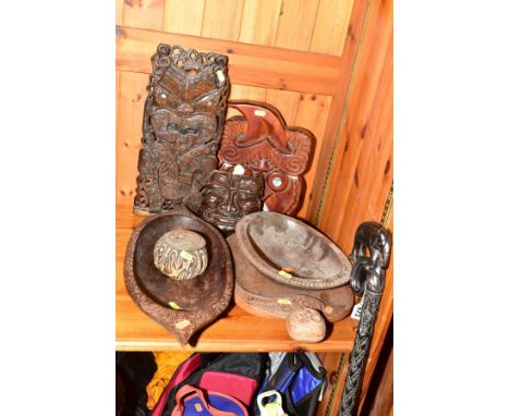 A COLLECTION OF TRIBAL AND OTHER CARVED MASKS, BOWLS, WALKING CANE ETC, including an elephant handle ebony walking stick, app