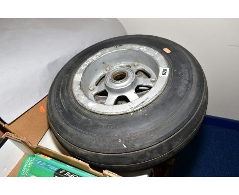 AN ALUMINIUM AIRCRAFT WHEEL WITH DUNLOP TYRE, wheel stamped with various codes ASSY AH9366, SS 8, SN67257, 4Q 76, AH 7911, IS
