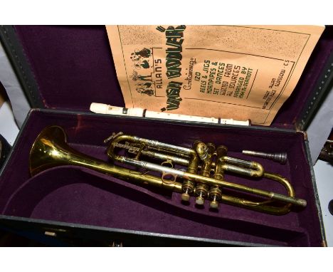 A CASED BESSON BRASS TRUMPET, Classic A, with a music booklet and a recorder