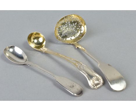 A VICTORIAN SILVER SIFTER SPOON AND TWO MUSTARD SPOONS, the sifter spoon of plain design, the a pierced ladle in a foliate de