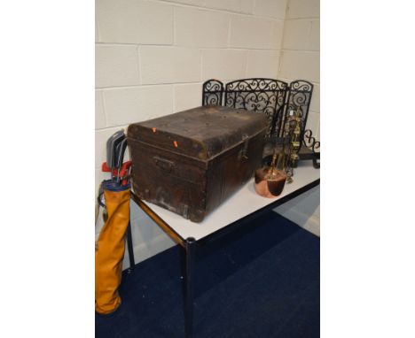 A WROUGHT IRON LOG TRAY, together with a metal triple fire screen, tin trunk, copper kettle, vintage golf clubs, etc (6)