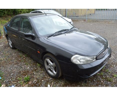 A FORD MONDEO ST24 2.5LTR V6 CAR, IN PANTHER BLACK METALLIC, with a Duratec 2.5L V6 24 valve DOHC petrol engine five speed ma