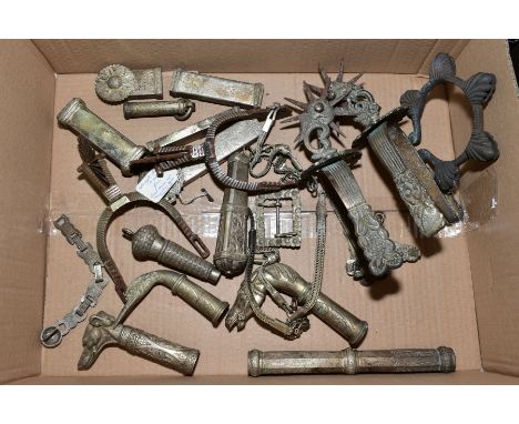 A BOX OF SILVER PLATED/WHITE METAL WALKING STICK HANDLES, two pairs of ornate spurs, dagger parts, buckle, bangle with bells,