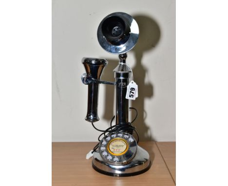 A REPRODUCTION G.E.C. CANDLESTICK TELEPHONE, chrome finish, wired for modern use, approximate height 34cm