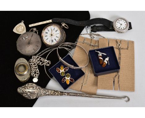 A SELECTION OF ITEMS, to include a silver scroll detail embossed button hook, with a Sheffield hallmark 1915 H.W. Limited, ch