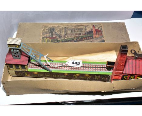 A BOXED TINPLATE CLOCKWORK COAL MINE TOY, No 591, modelled as a pit head and engine house with wagon running on an incline be