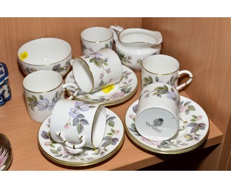 A ROYAL WORCESTER 'JUNE GARLAND' PART COFFEE SERVICE, comprising six coffee cups and six saucers, milk jug and sugar bowl