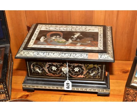A 19TH CENTURY CONTINENTAL RENAISSANCE REVIVAL EBONISED AND INLAID CASKET, the hinged top with scene of cherubs and merpeople