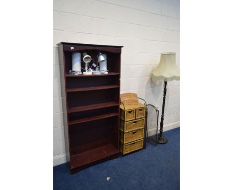 A MODERN MAHOGANY OPEN BOOKCASE, together with a wrought iron and wicker chest of five drawers, standard lamp with fabric sha