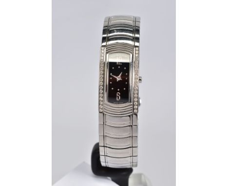 A LADIES MAUBOUSSIN WRISTWATCH IN STAINLESS STEEL AND DIAMOND, oblong case measuring 32mm x 17.9mm, the case is diamond set t