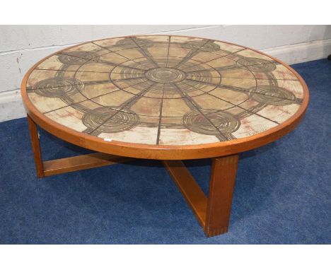 A CIRCULAR TRIOH OX ART DANISH TEAK COFFEE TABLE on a cross framed visible mortice and tenon joint detail sleigh legs, diamet