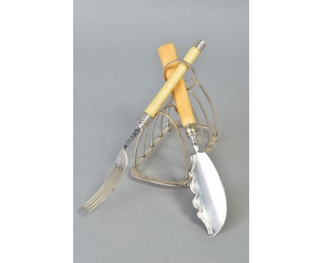 A SILVER TOAST RACK AND BONE HANDLED BUTTER KNIFE AND DESSERT FORK, the toast rack with four dividers and a loop to the top, 